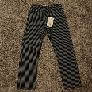 Size 29 Levi Wedgie Straight Jeans that are blue with white stripes
